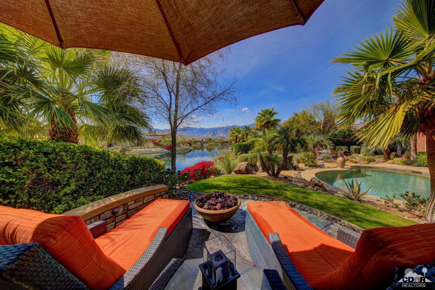 5 Via Santa Velera Rancho Mirage, CA 92270 - Photo 61 of 90 a view of swimming pool with a patio and a yard