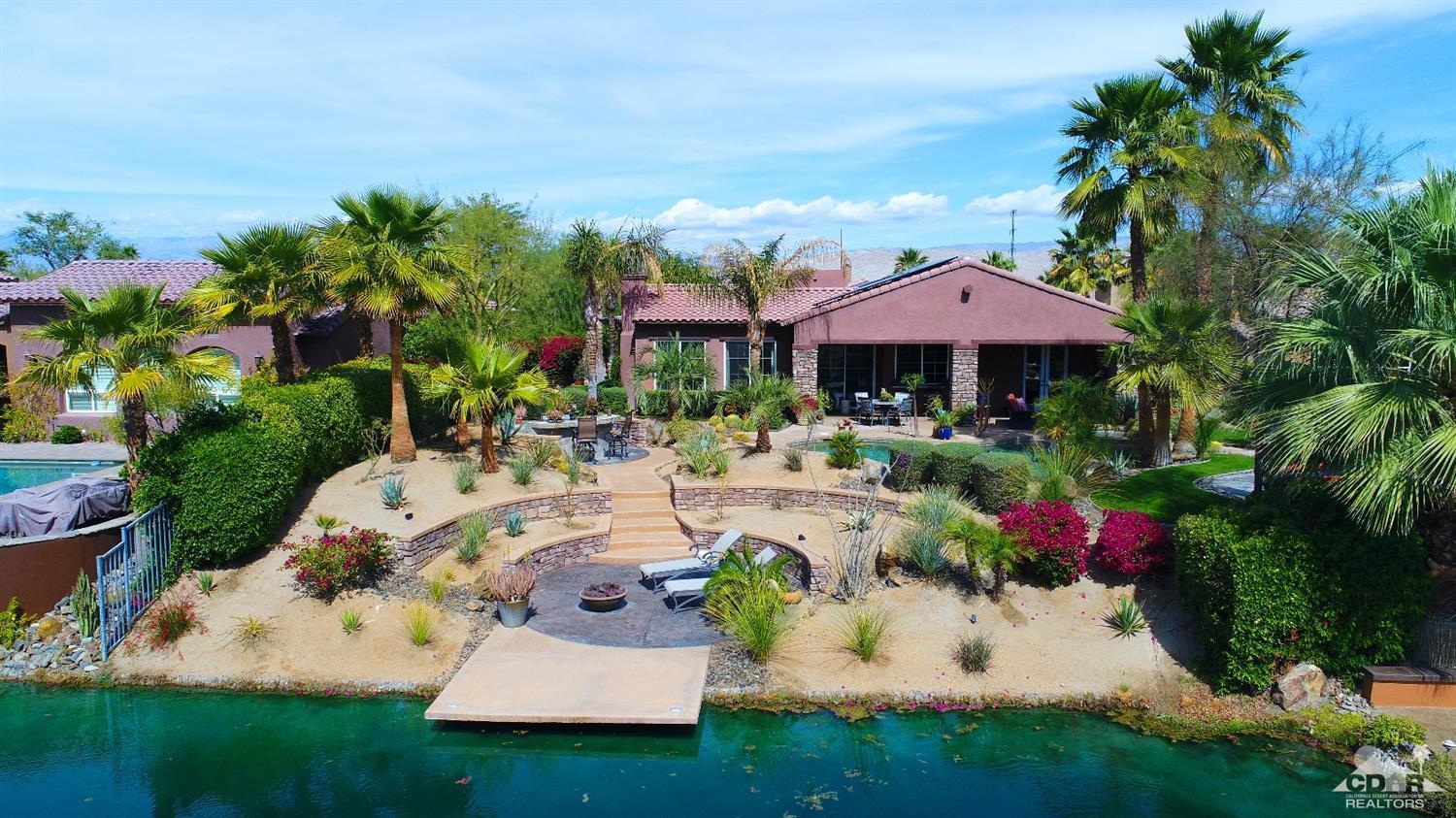 5 Via Santa Velera Rancho Mirage, CA 92270 - Photo 8 of 90 a view of a house with a yard and sitting area