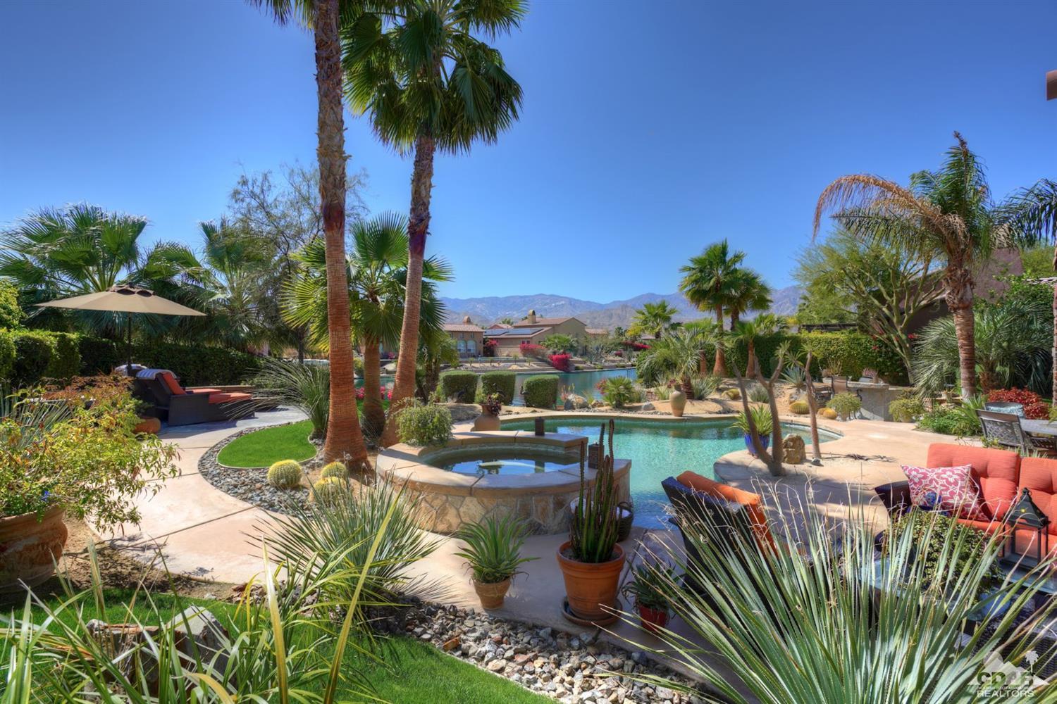 5 Via Santa Velera Rancho Mirage, CA 92270 - Photo 74 of 90 a view of a swimming pool with a patio