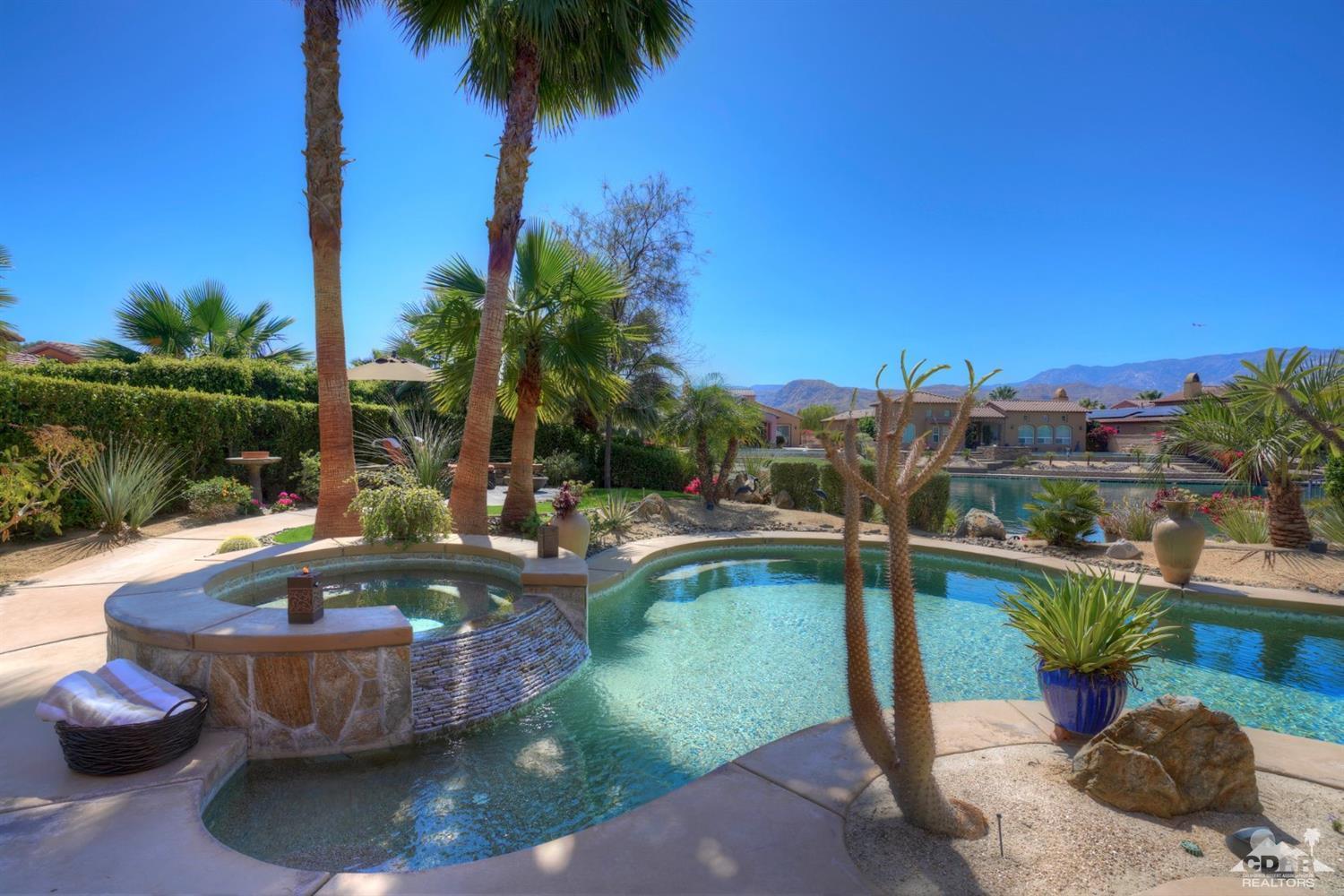5 Via Santa Velera Rancho Mirage, CA 92270 - Photo 79 of 90 a view of a swimming pool with a patio