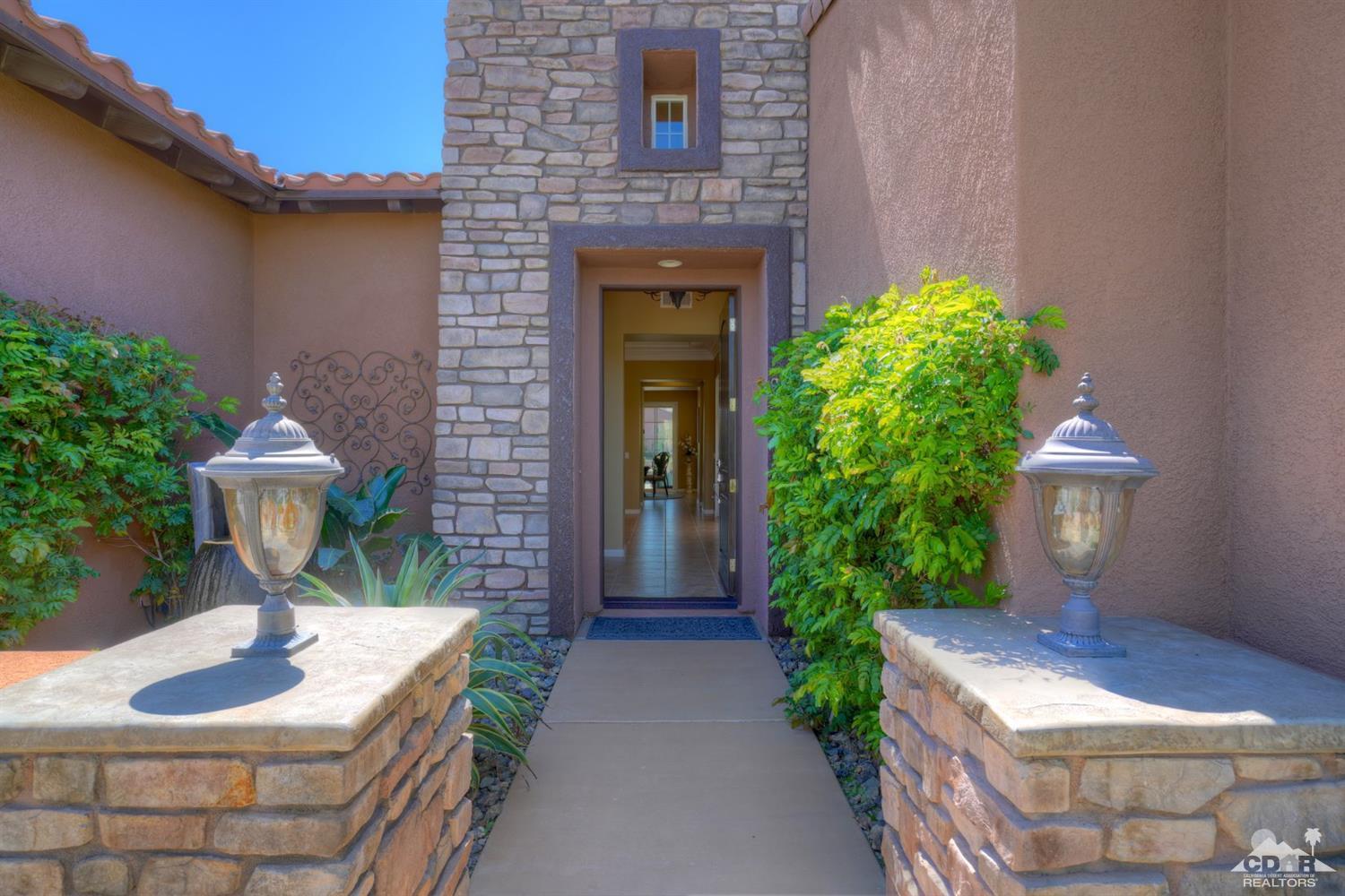 5 Via Santa Velera Rancho Mirage, CA 92270 - Photo 90 of 90 a front view of a house with garden