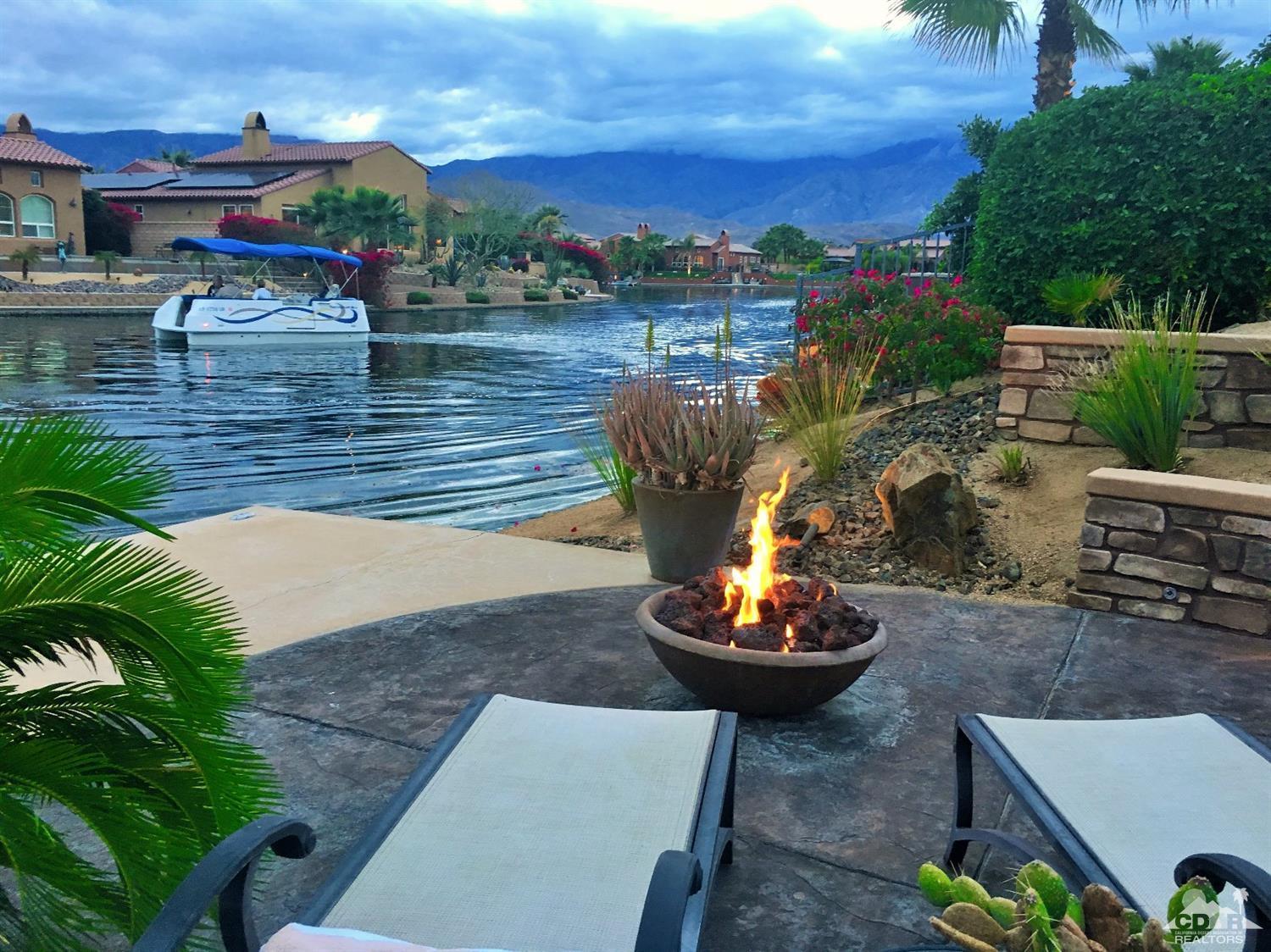 5 Via Santa Velera Rancho Mirage, CA 92270 - Photo 10 of 90 a view of a swimming pool with a patio