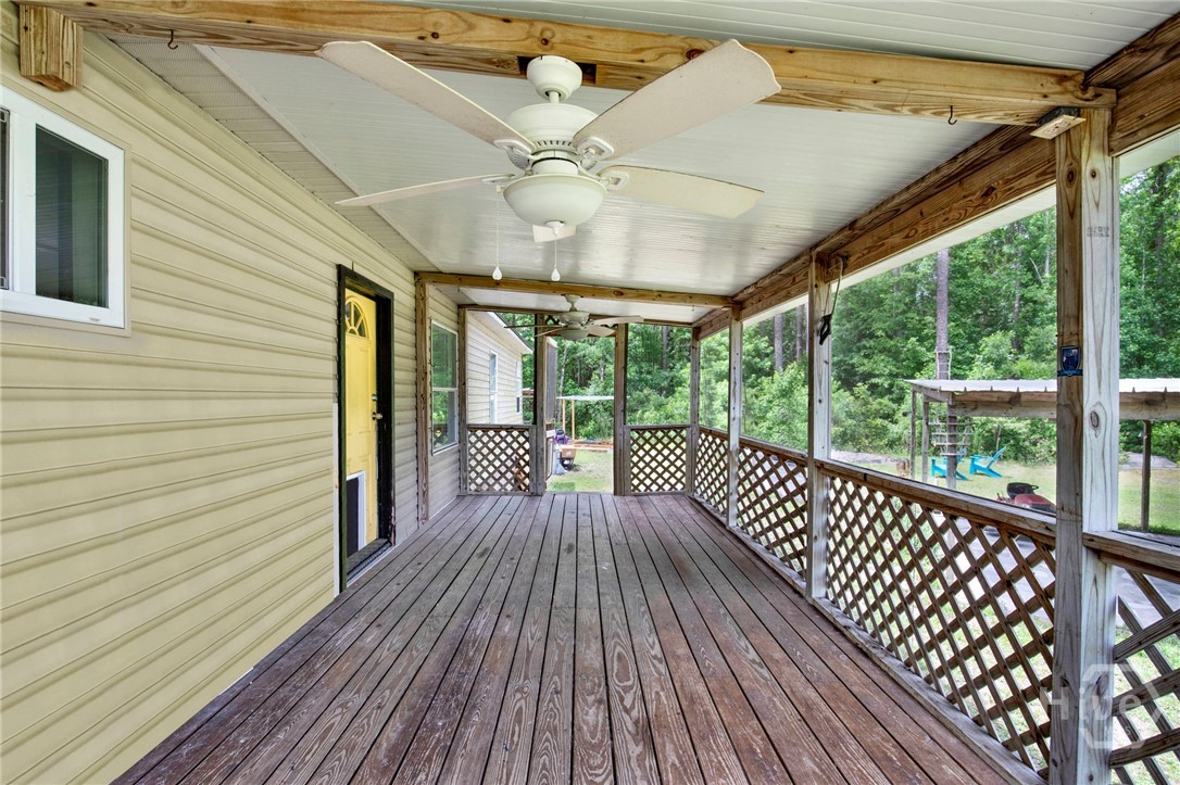 126 Oak Street Rincon, GA 31326 - Photo 6 of 33 Screened-in Deck