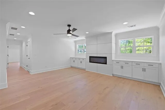 a view of a back yard with a flower garden