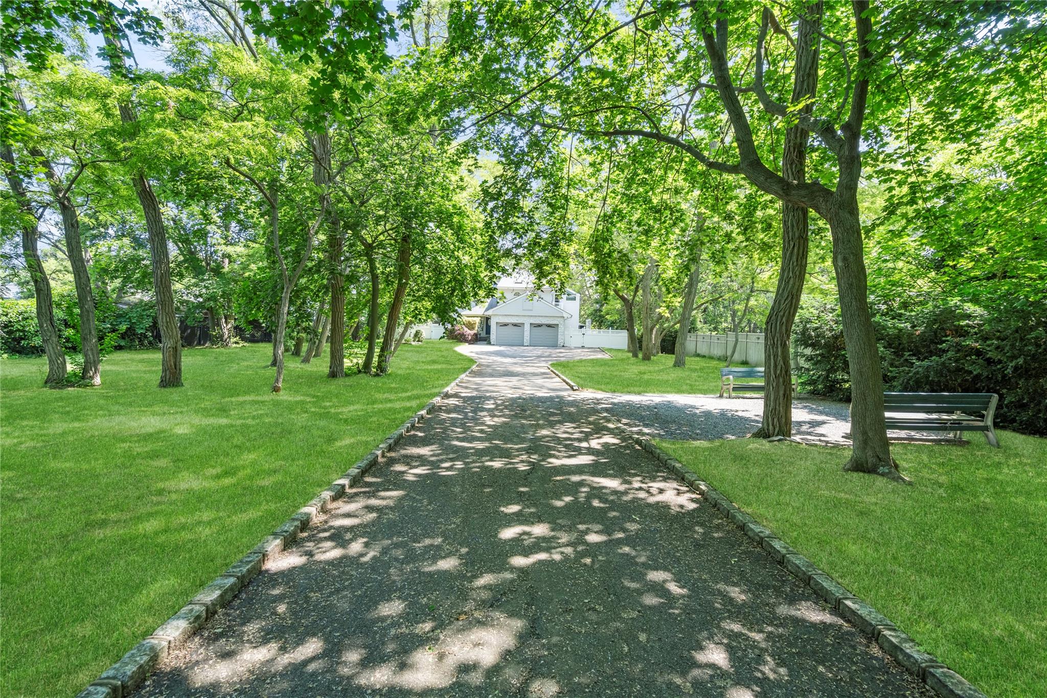 a garden view with a sitting space