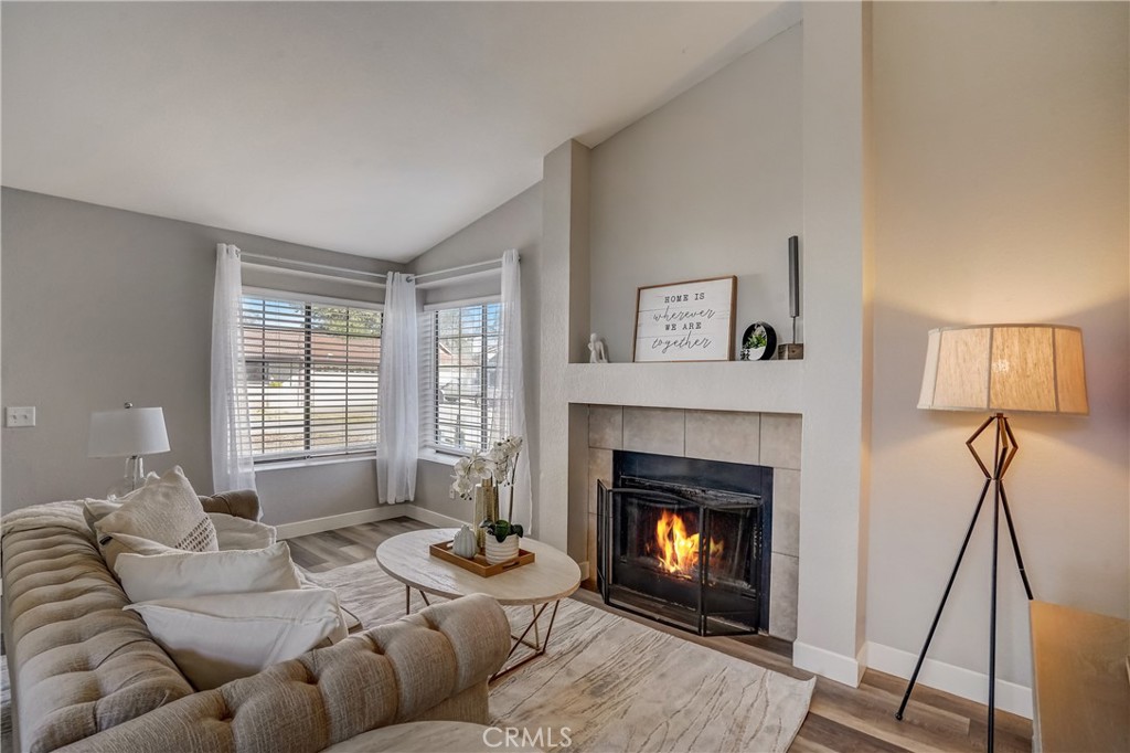 39429 Long Ridge Drive Temecula, CA 92591 - Photo 1 of 23 a living room with furniture and a fireplace