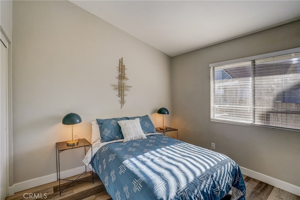 39429 Long Ridge Drive Temecula, CA 92591 - Photo 12 of 23 a bedroom with a bed and window
