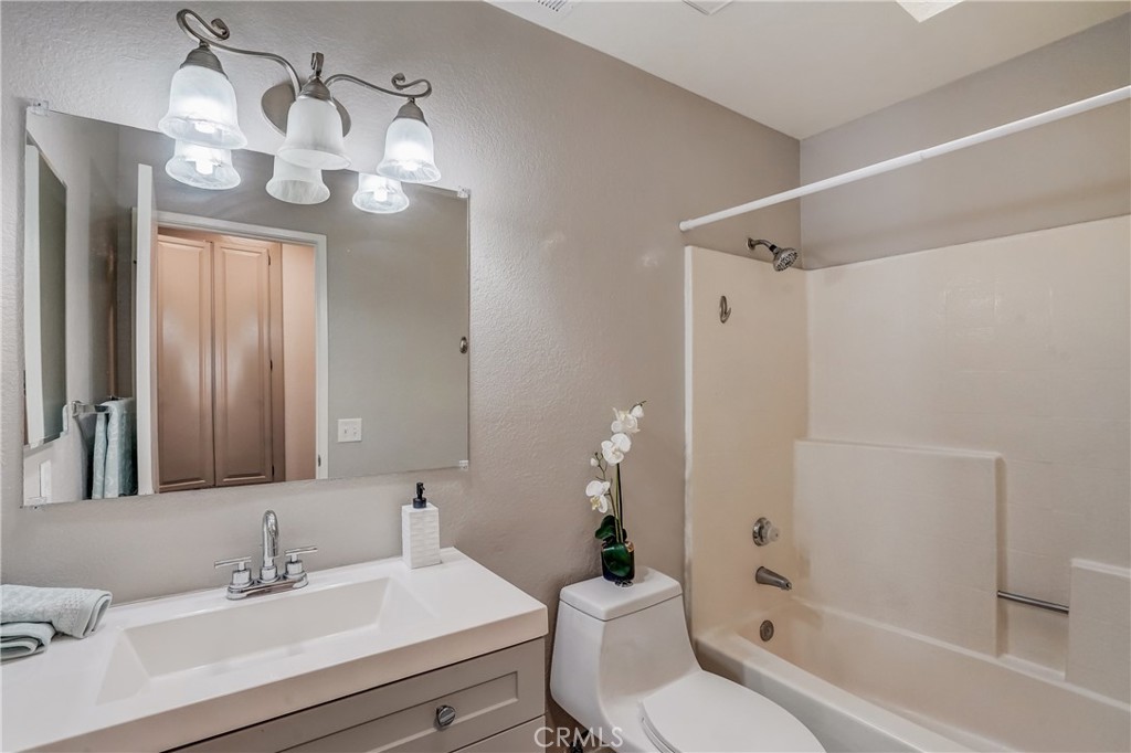 39429 Long Ridge Drive Temecula, CA 92591 - Photo 16 of 23 a bathroom with a sink a toilet and shower
