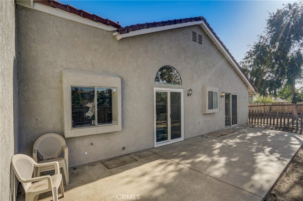 39429 Long Ridge Drive Temecula, CA 92591 - Photo 17 of 23 a backyard of a house with table and chairs