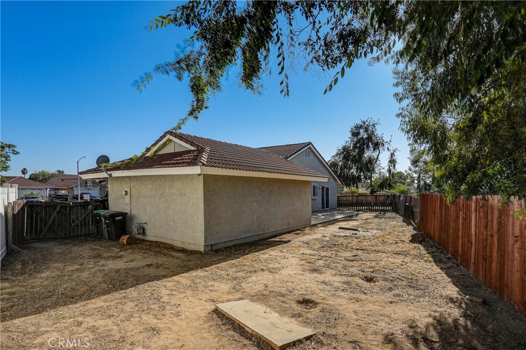 39429 Long Ridge Drive Temecula, CA 92591 - Photo 21 of 23 a view of a house with a yard