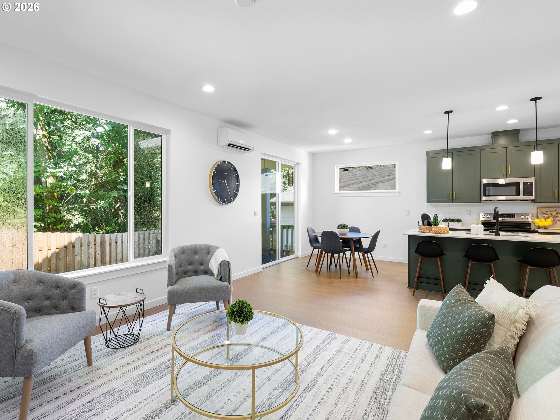 2171 Northeast 207th Place Fairview, OR 97024 - Photo 15 of 37 a living room with furniture kitchen and a large window