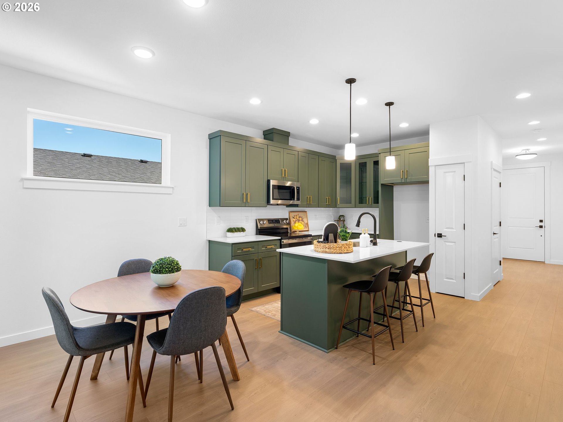 2171 Northeast 207th Place Fairview, OR 97024 - Photo 8 of 37 a view of a dining room with furniture