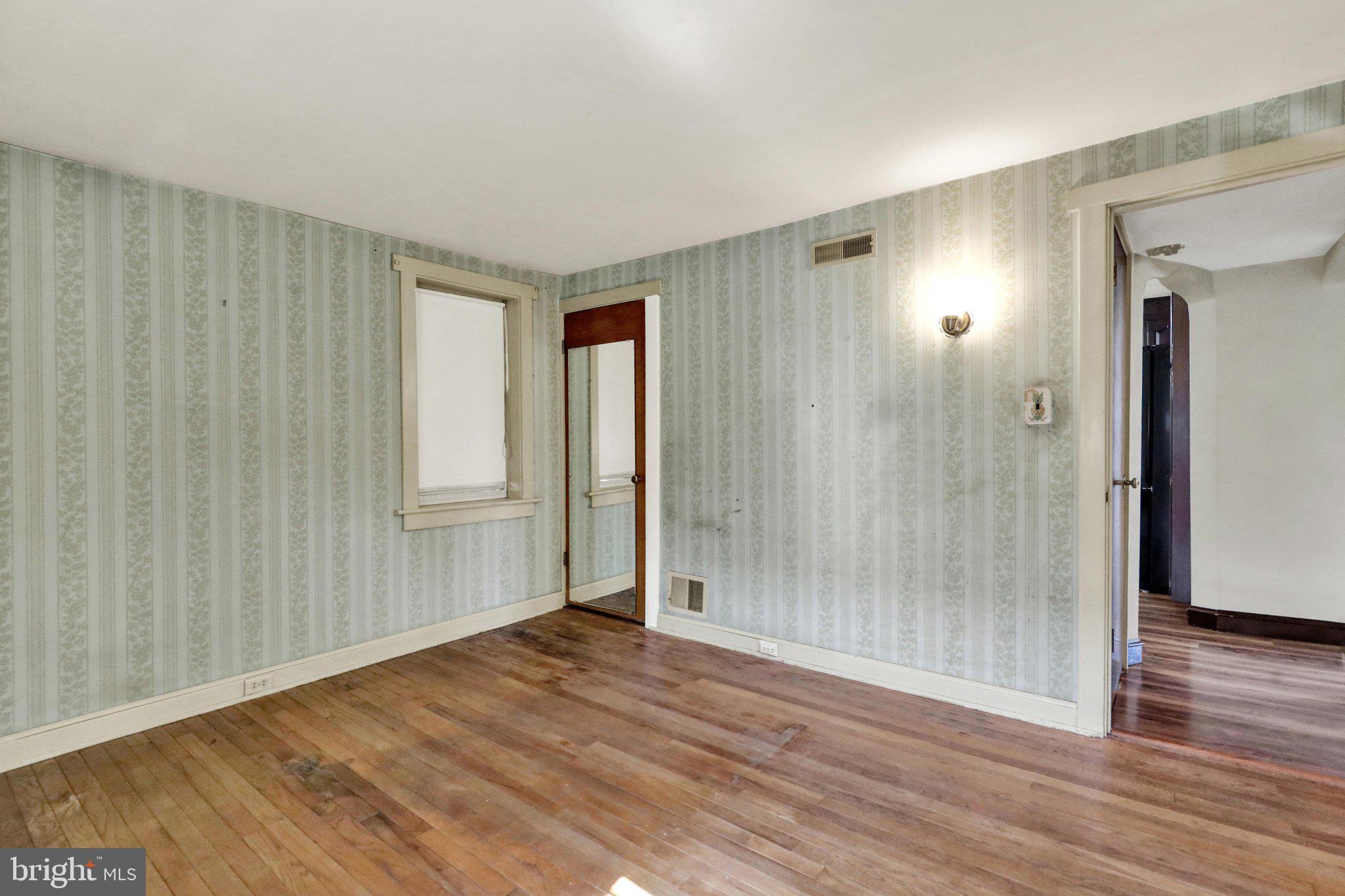 24 Ardmore Avenue Reading, PA 19607 - Photo 25 of 40 a view of wooden floor and windows in a room