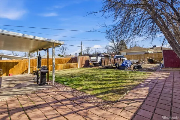 a view of a swimming pool with a patio