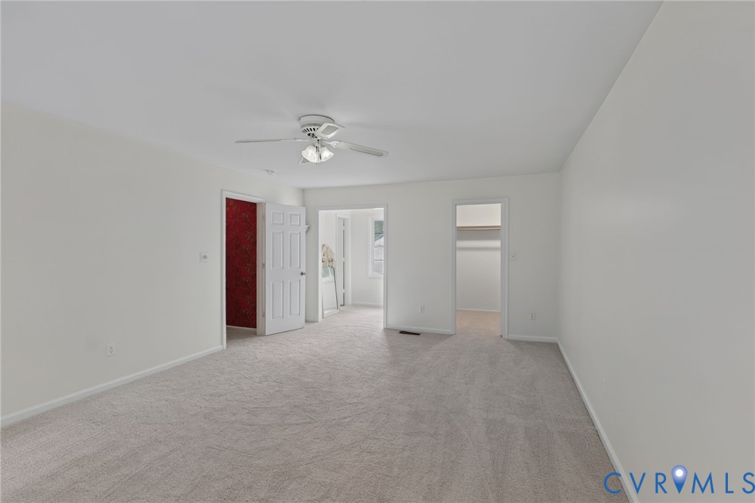 3007 Five Forks Road Pamplin, VA 23958 - Photo 27 of 82 Neutral wall tones, ceiling fan with integrated li