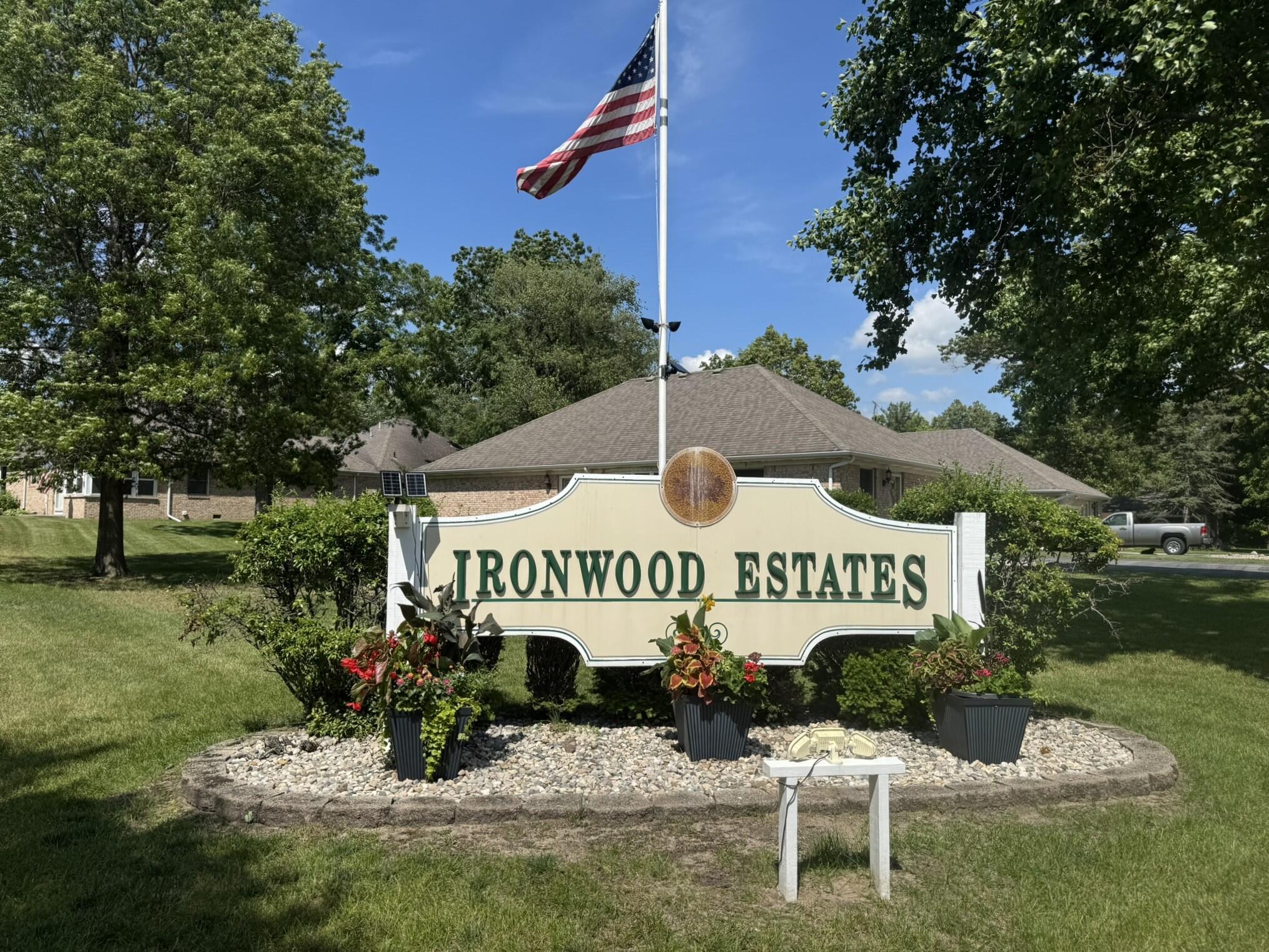 641 D Begonia Street Southeast De Motte, IN 46310 - Photo 11 of 39 a sign that is sitting in front of a house