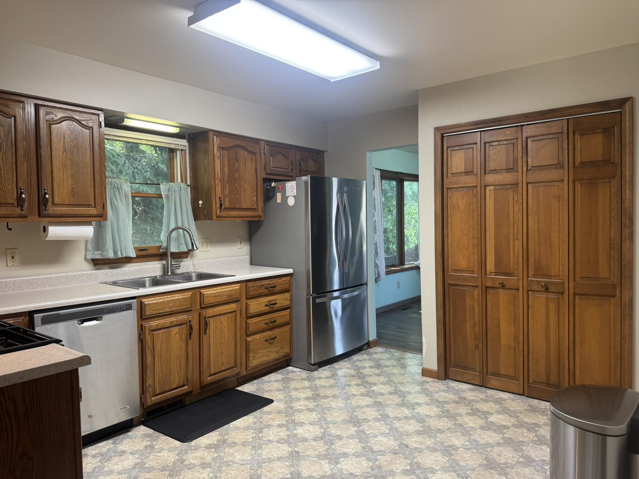 641 D Begonia Street Southeast De Motte, IN 46310 - Photo 17 of 39 a large bathroom with a sink and a large mirror