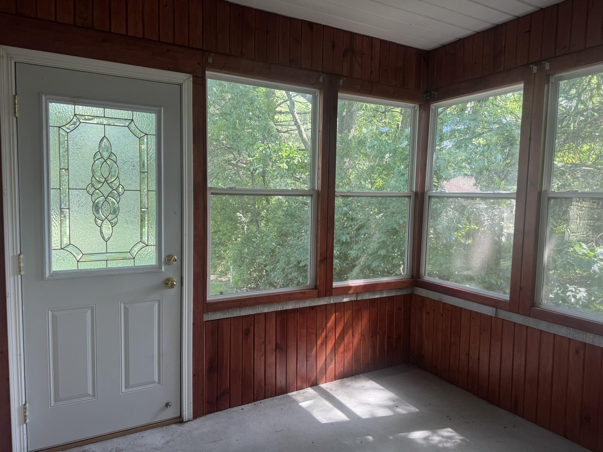 641 D Begonia Street Southeast De Motte, IN 46310 - Photo 21 of 39 wooden floor in an empty room with a window