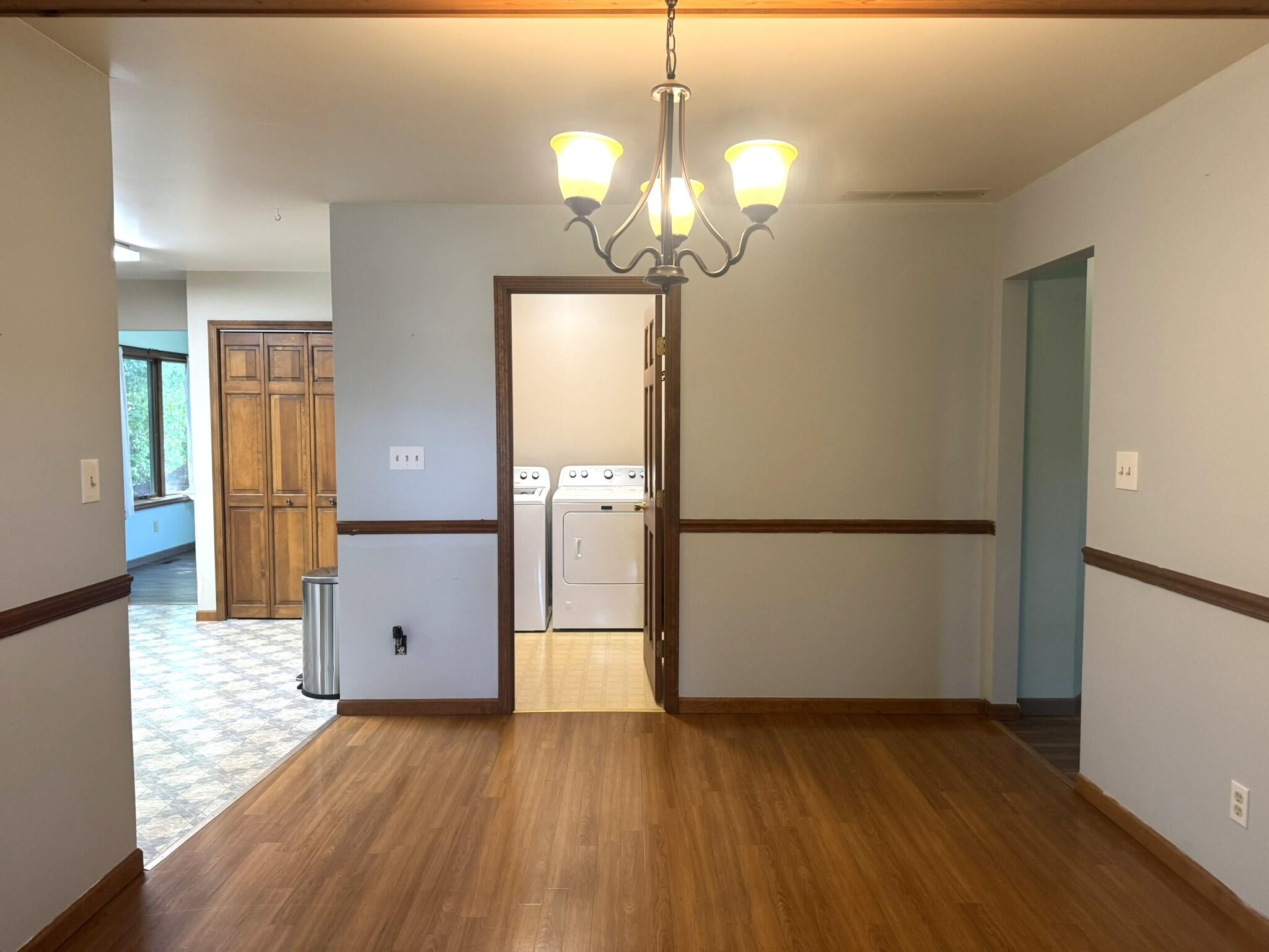 641 D Begonia Street Southeast De Motte, IN 46310 - Photo 23 of 39 a view of a hallway with wooden floor
