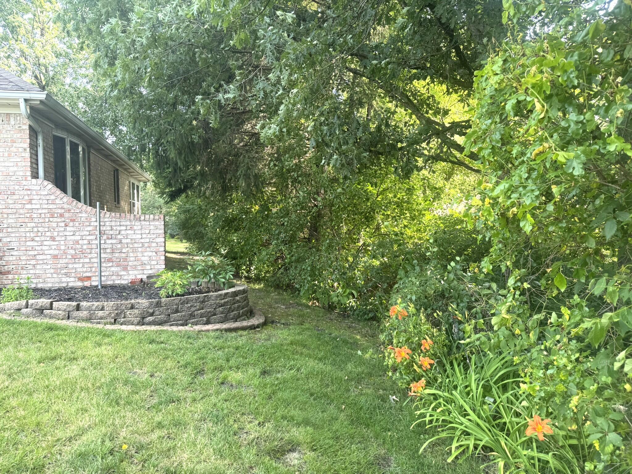 641 D Begonia Street Southeast De Motte, IN 46310 - Photo 5 of 39 a view of a house with a yard