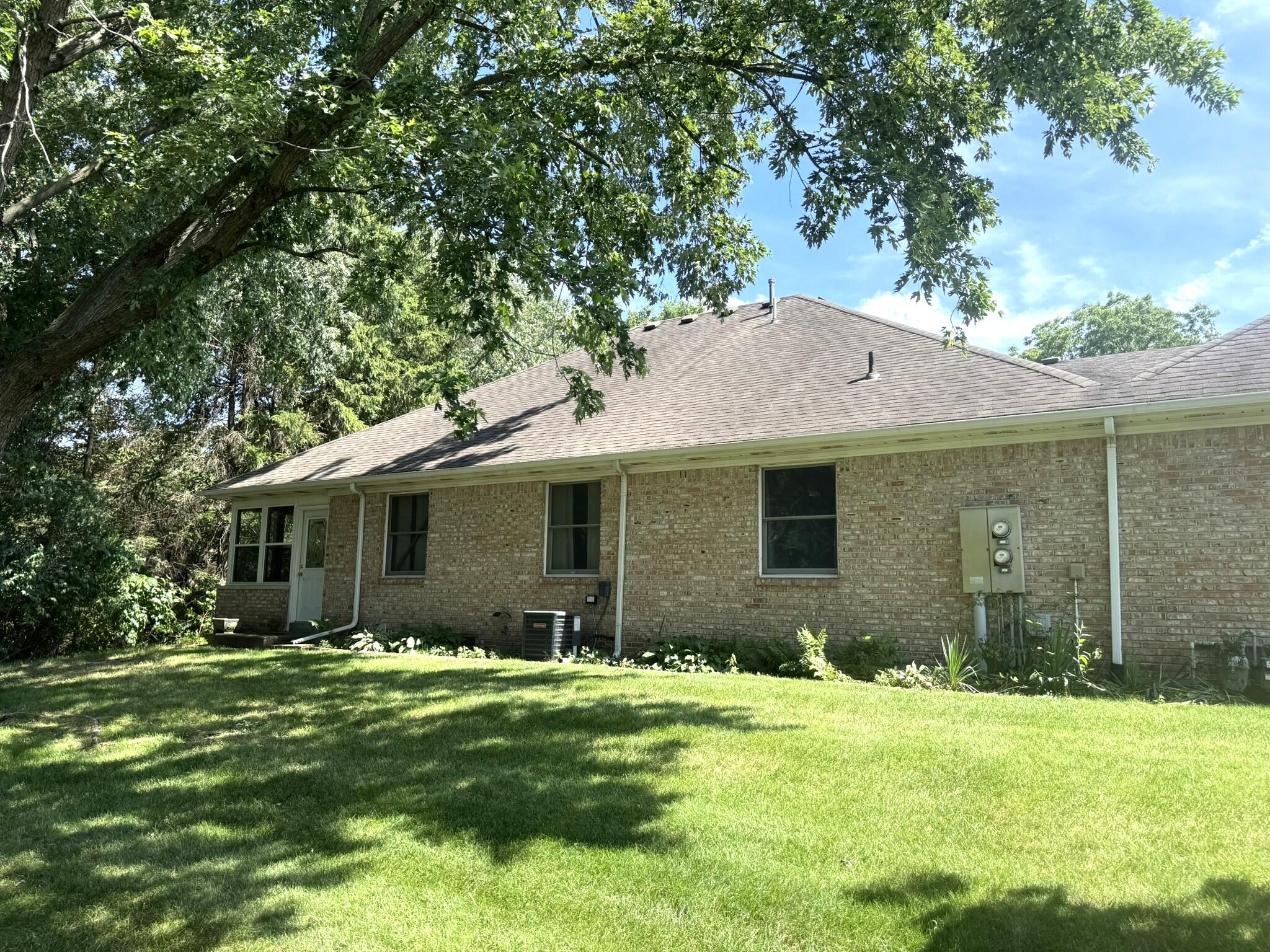 641 D Begonia Street Southeast De Motte, IN 46310 - Photo 6 of 39 a view of a house with a yard