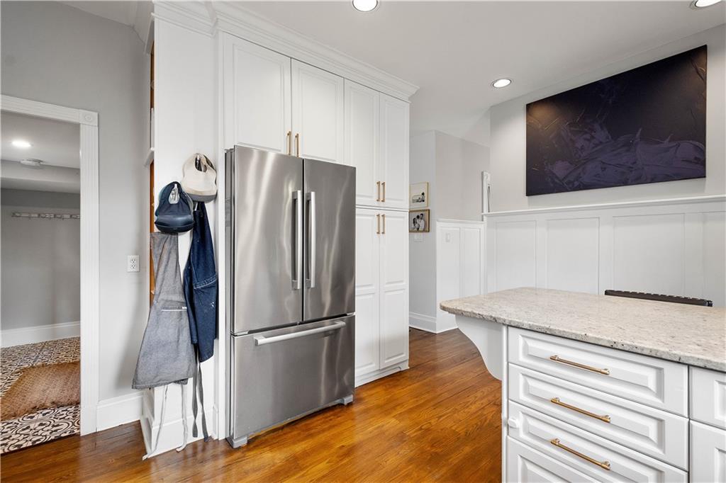 419 Oliver Road Sewickley, PA 15143 - Photo 11 of 34 a kitchen with stainless steel appliances granite countertop a refrigerator and a microwave