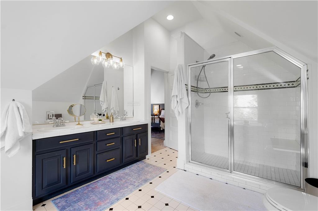 419 Oliver Road Sewickley, PA 15143 - Photo 17 of 34 a bathroom with a tub sink shower and mirror