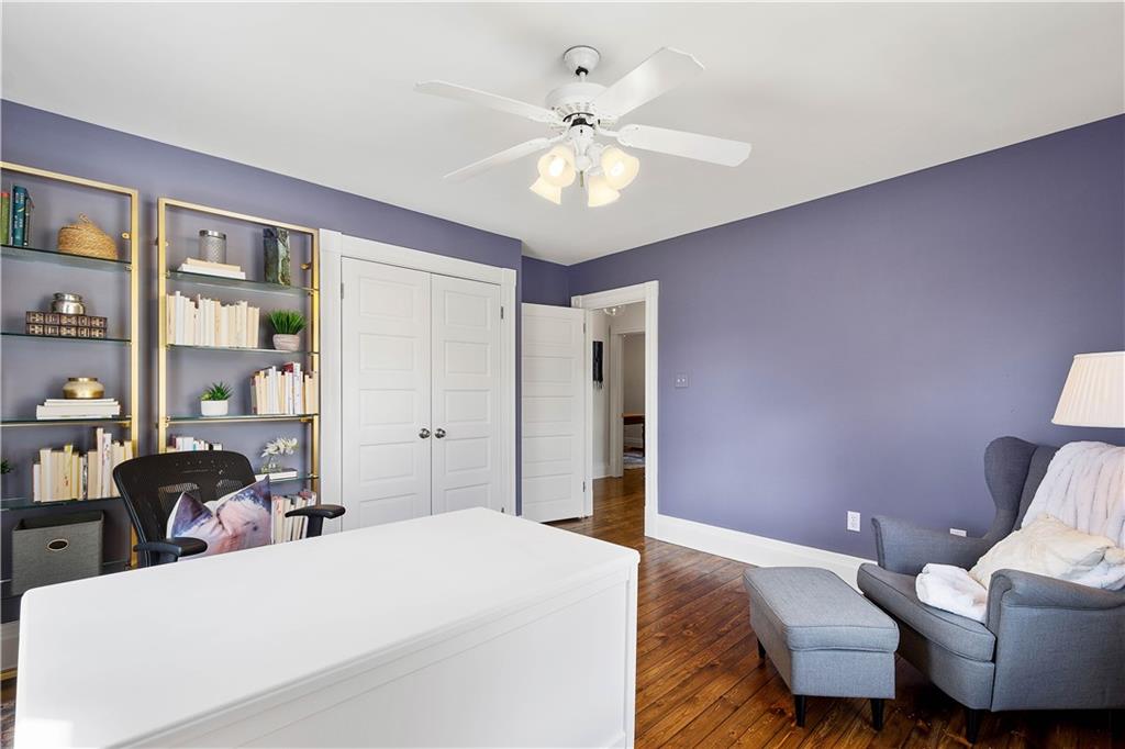 419 Oliver Road Sewickley, PA 15143 - Photo 22 of 34 a bed room with a bed and a chandelier