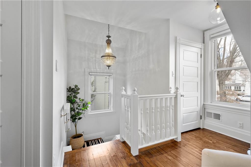 419 Oliver Road Sewickley, PA 15143 - Photo 24 of 34 a view of a room with wooden floor and windows