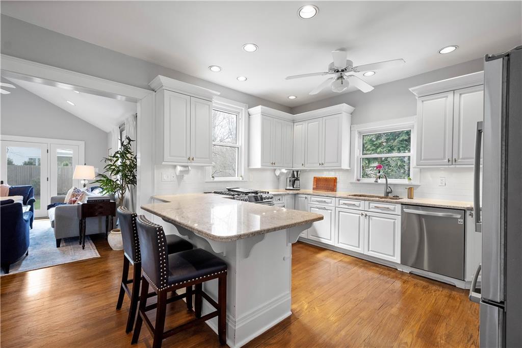 419 Oliver Road Sewickley, PA 15143 - Photo 3 of 34 a kitchen with a center island appliances and cabinets