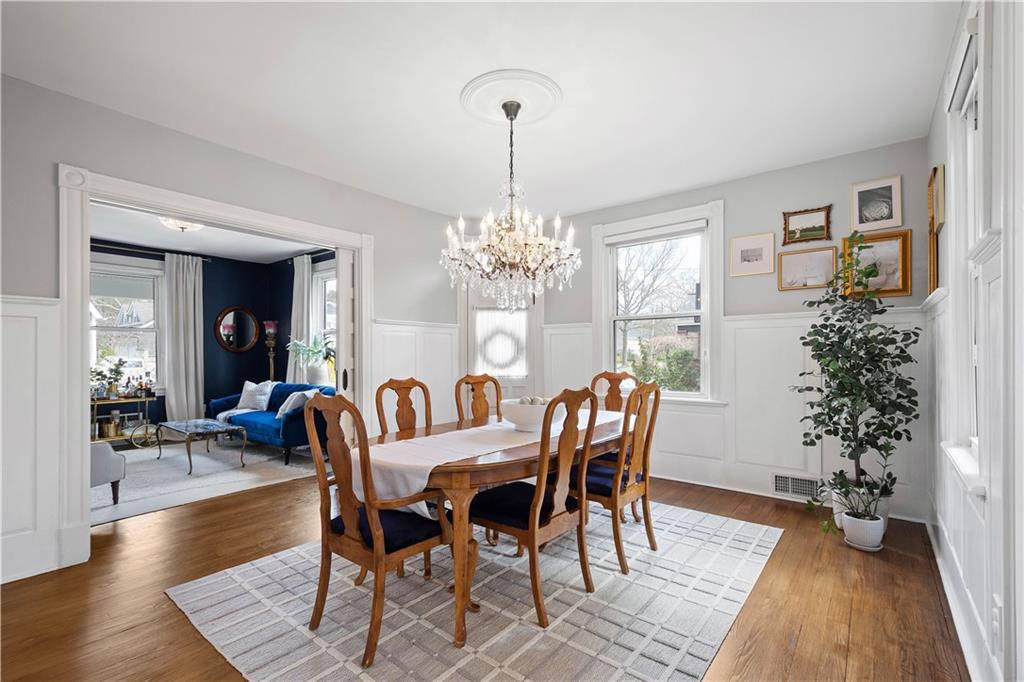 419 Oliver Road Sewickley, PA 15143 - Photo 8 of 34 a view of a dining room with furniture window and wooden floor