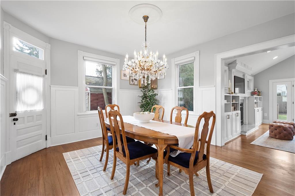 419 Oliver Road Sewickley, PA 15143 - Photo 9 of 34 a view of a dining room with furniture window and wooden floor