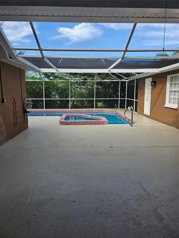 a view of a backyard with a small cabin