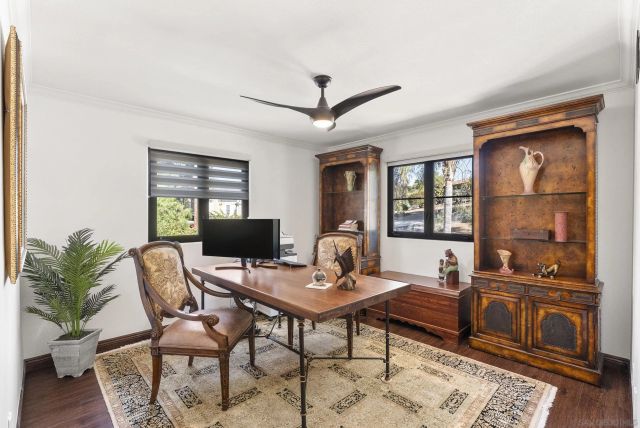 a view of a workspace with furniture