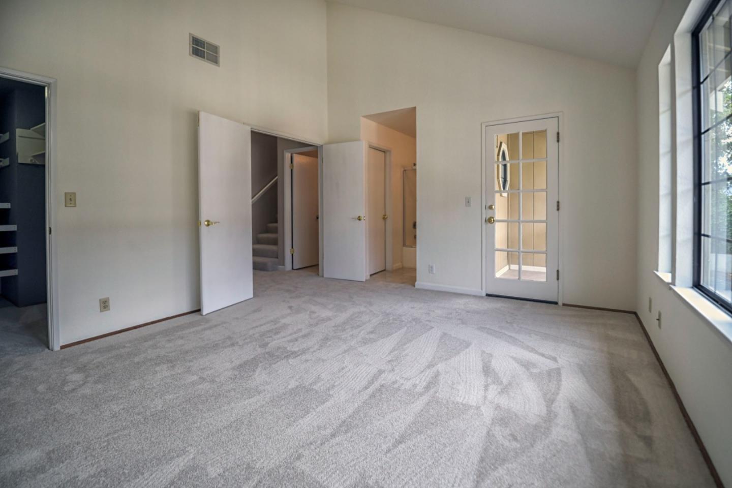 584 Valeri Ruth Court Santa Clara, CA 95050 - Photo 14 of 27 an empty room with windows and closet