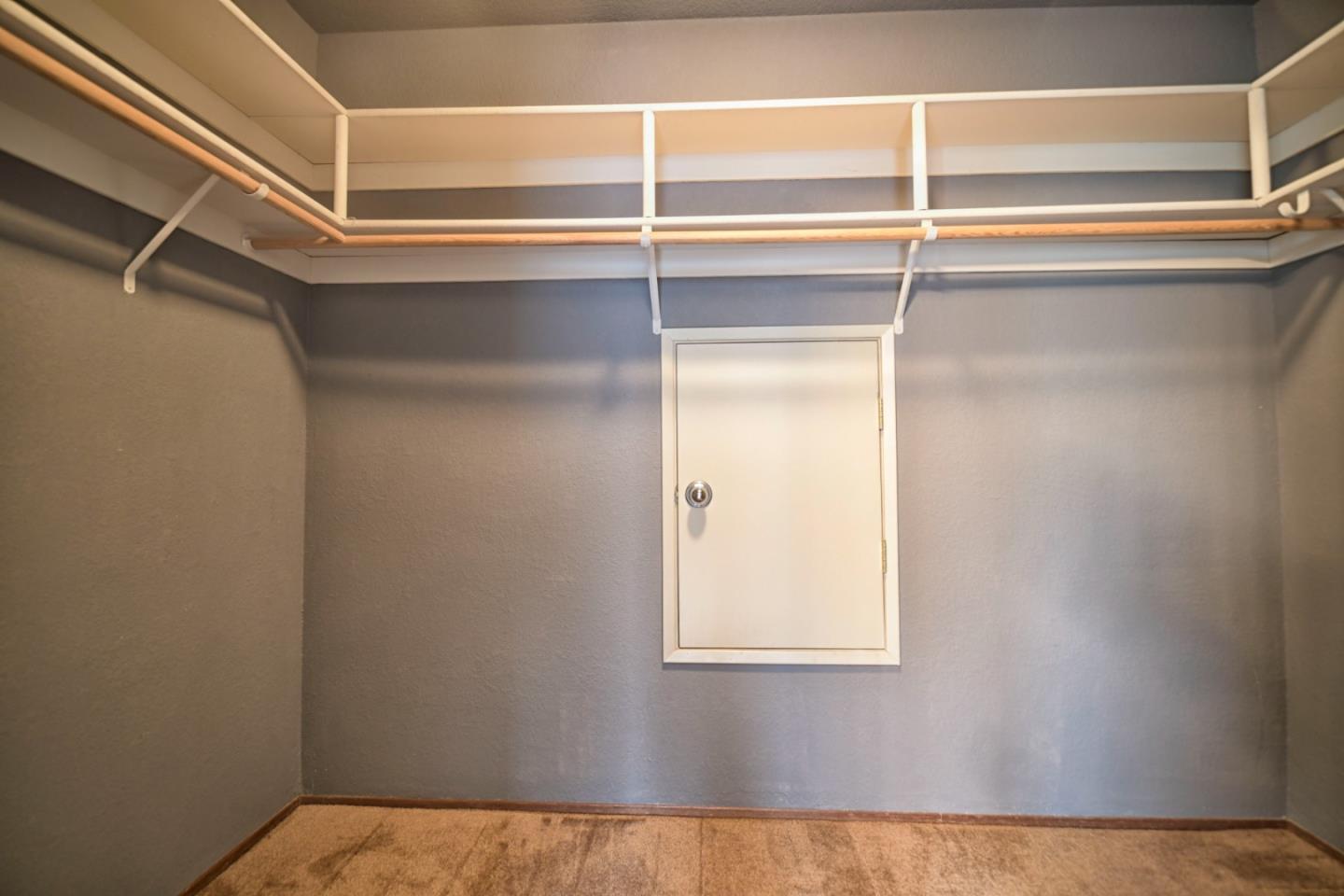 584 Valeri Ruth Court Santa Clara, CA 95050 - Photo 27 of 27 a view of a room with rack on the wall and a window