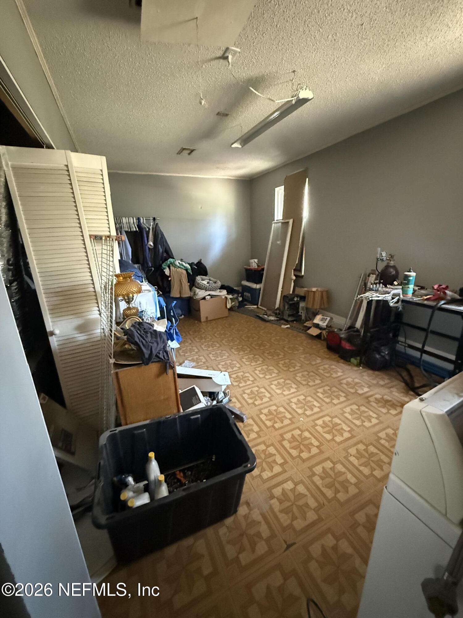 45 Mint Circle Middleburg, FL 32068 - Photo 16 of 24 a room with gym equipment