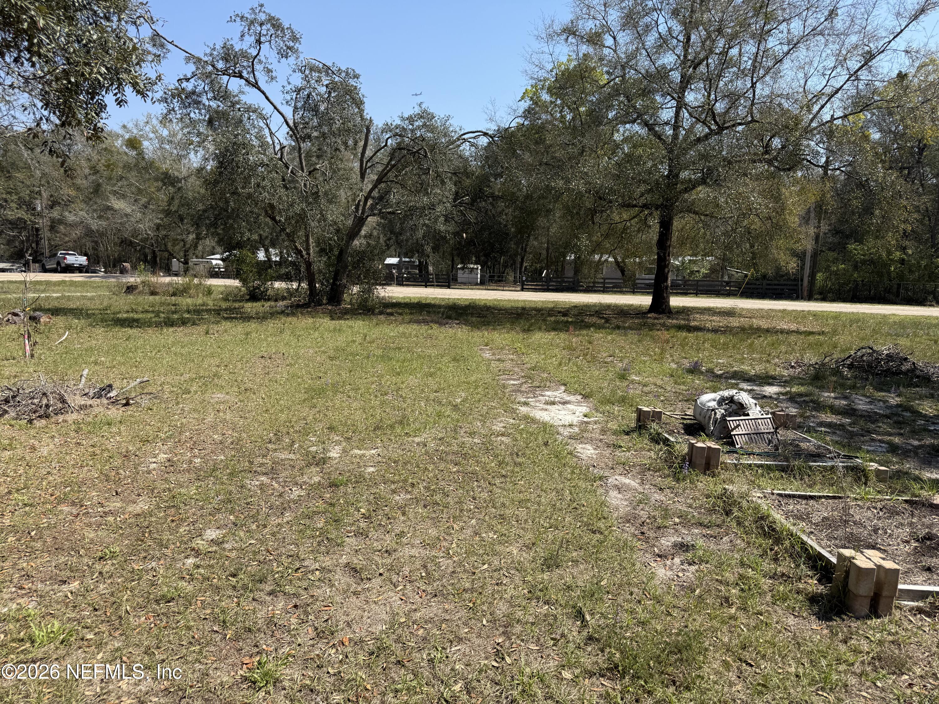 45 Mint Circle Middleburg, FL 32068 - Photo 21 of 24 a view of a lake with houses