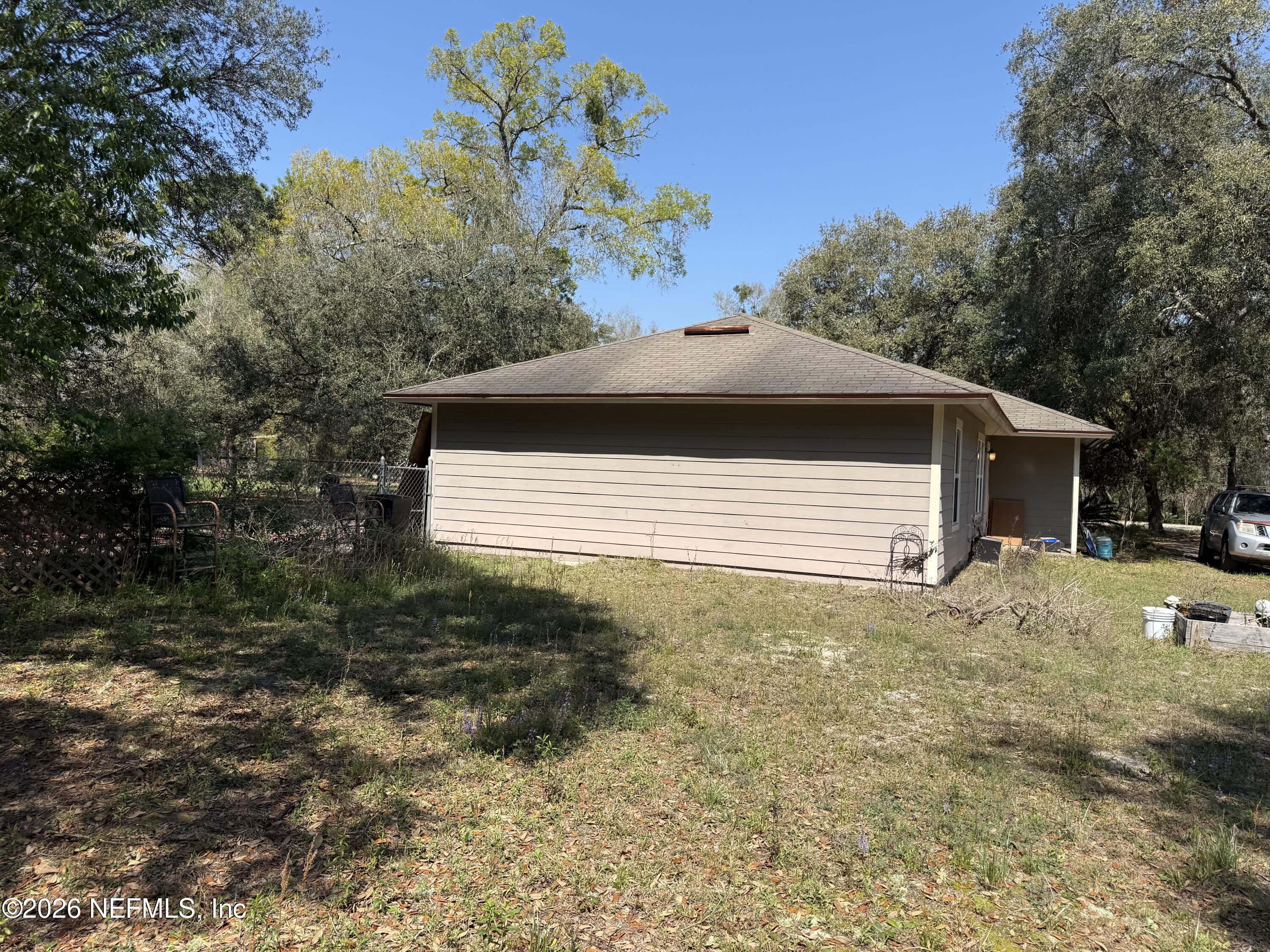 45 Mint Circle Middleburg, FL 32068 - Photo 9 of 24 a house with a yard