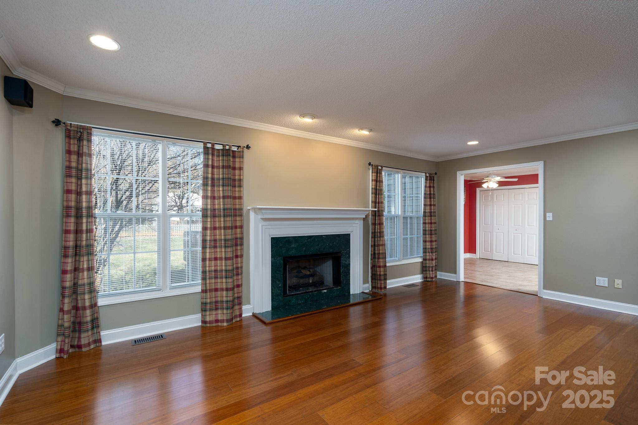 280 Bonaventure Drive Salisbury, NC 28147 - Photo 25 of 48 a view of an empty room with wooden floor and a window