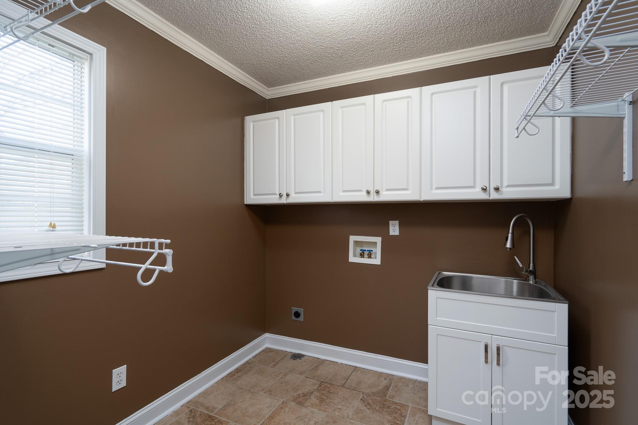 280 Bonaventure Drive Salisbury, NC 28147 - Photo 26 of 48 a view of storage and utility room with washer and dryer