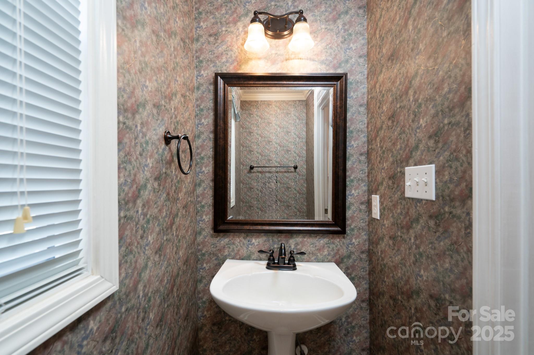 280 Bonaventure Drive Salisbury, NC 28147 - Photo 27 of 48 a bathroom with a sink and a mirror