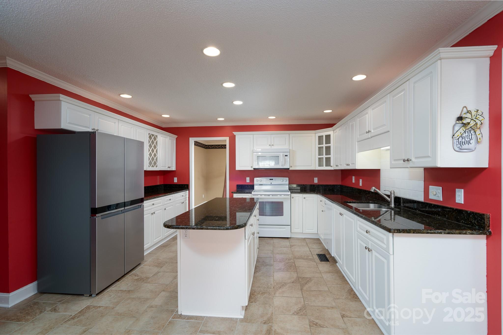 280 Bonaventure Drive Salisbury, NC 28147 - Photo 29 of 48 a kitchen with stainless steel appliances a refrigerator and a sink