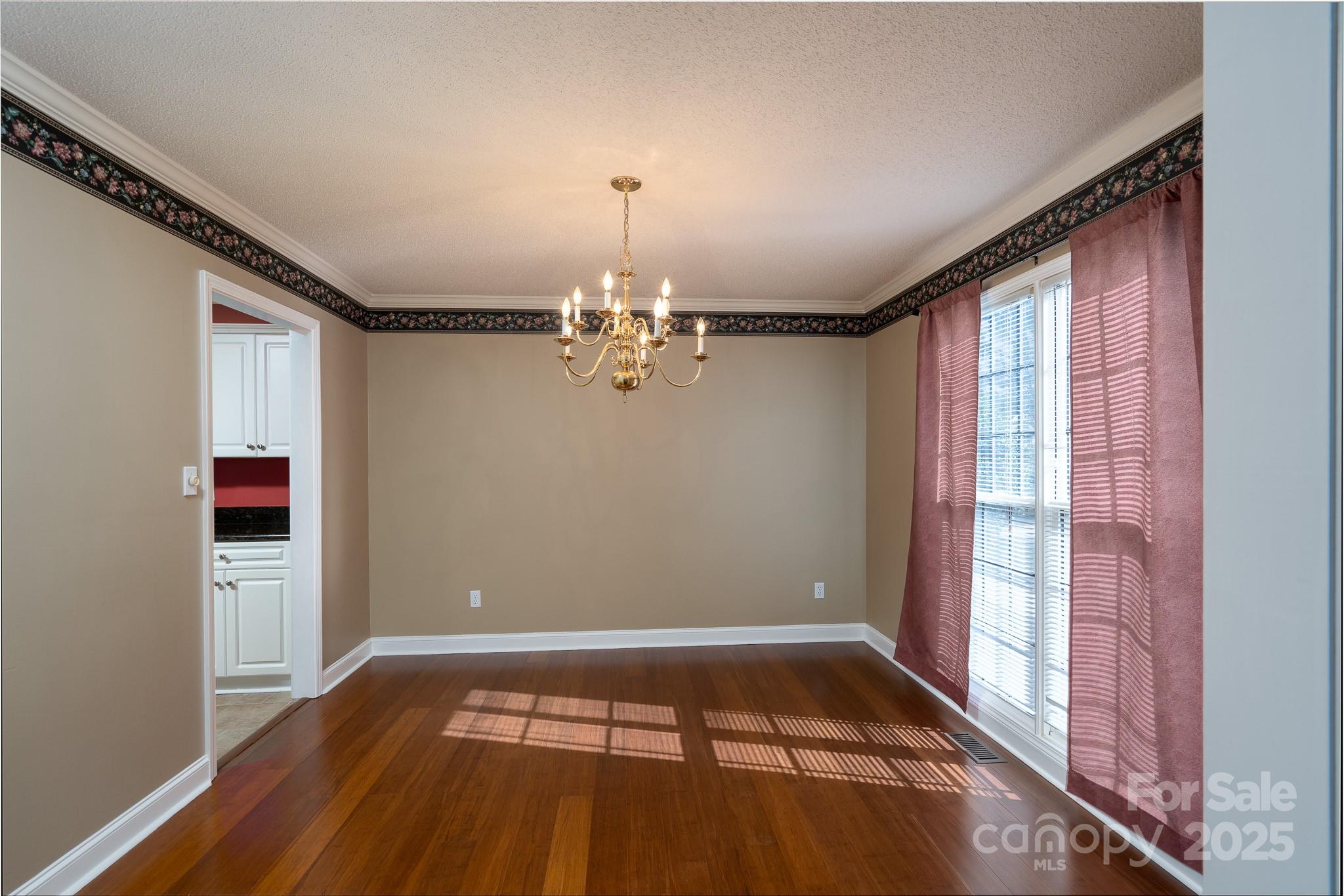 280 Bonaventure Drive Salisbury, NC 28147 - Photo 34 of 48 a view of empty room with wooden floor and fan
