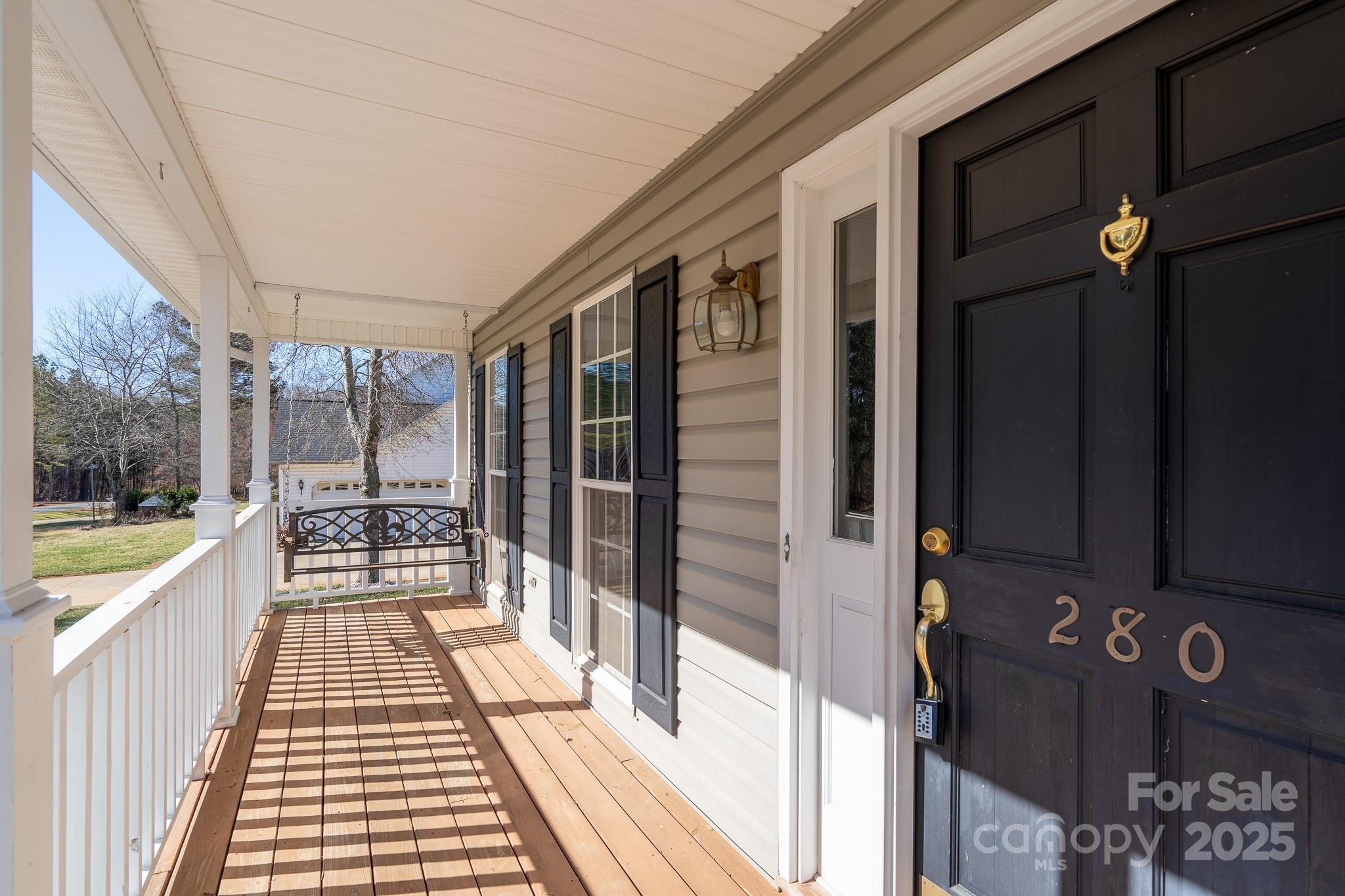 280 Bonaventure Drive Salisbury, NC 28147 - Photo 39 of 48 a view of a balcony with wooden floor