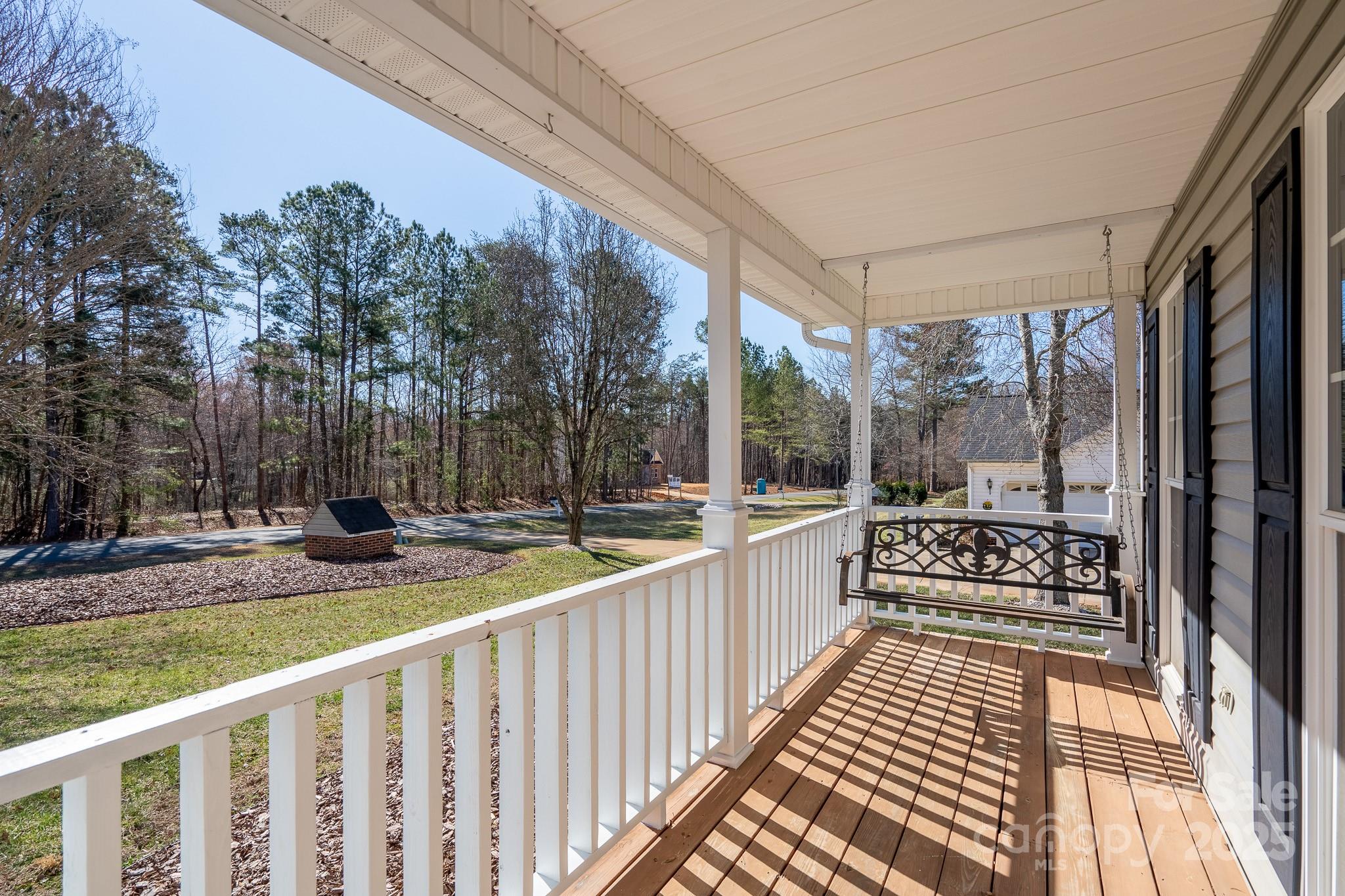 280 Bonaventure Drive Salisbury, NC 28147 - Photo 40 of 48 a view of a balcony with wooden floor and fence