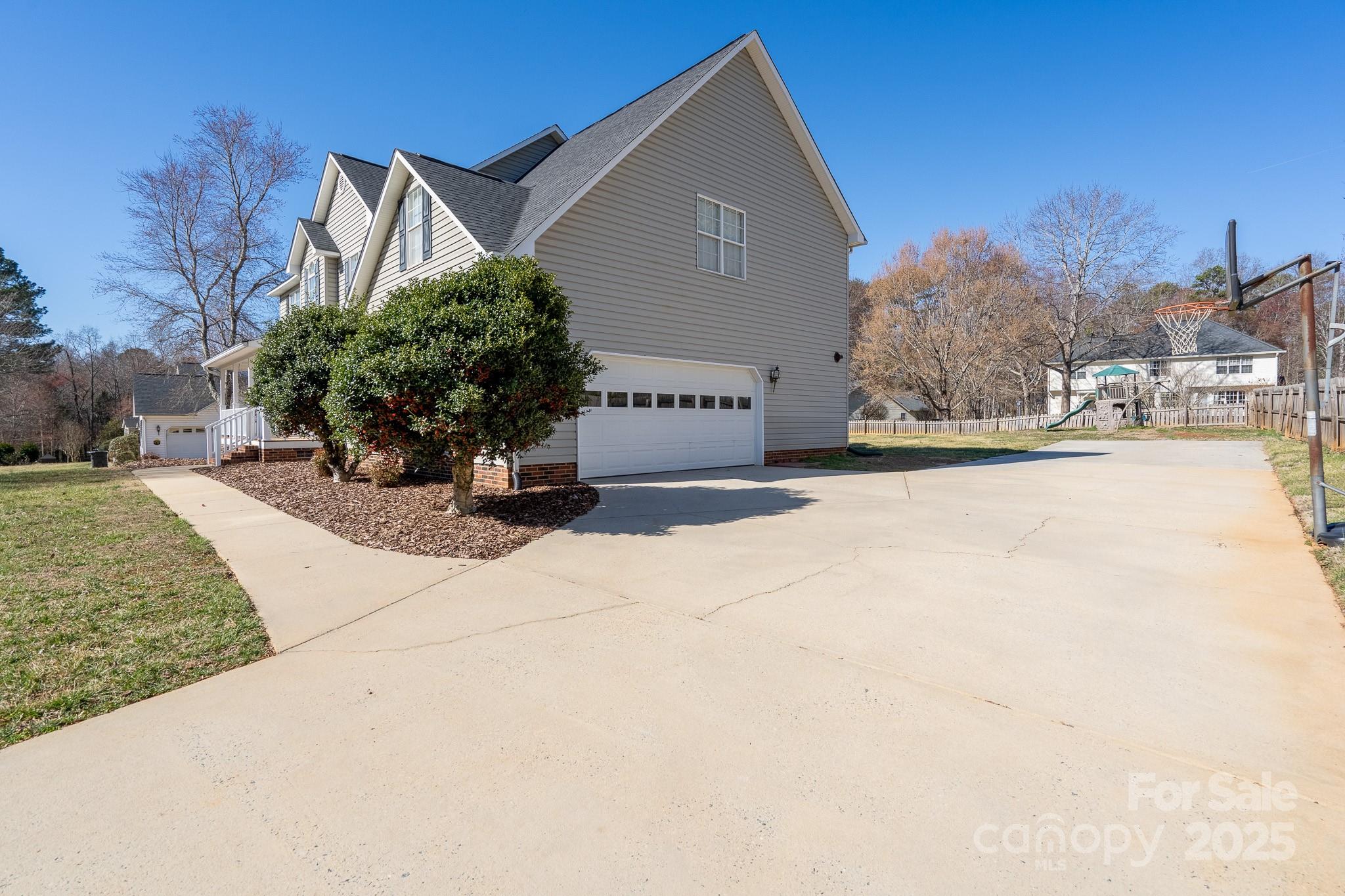 280 Bonaventure Drive Salisbury, NC 28147 - Photo 41 of 48 a front view of a house with a yard and garage