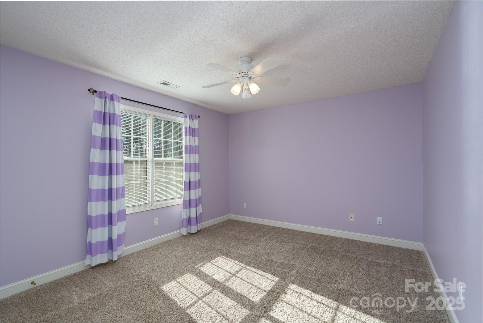 280 Bonaventure Drive Salisbury, NC 28147 - Photo 8 of 48 an empty room with windows