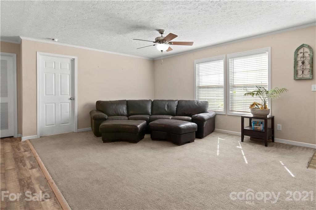 1085 Rhyne Road Clover, SC 29710 - Photo 14 of 23 a living room with furniture and a window