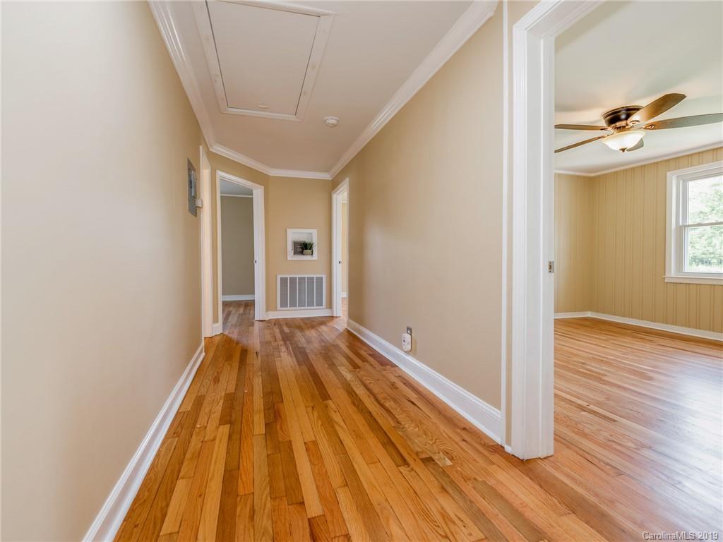 1084 Memorial Park Road Lancaster, SC 29720 - Photo 11 of 24 a view of a room with wooden floor and staircase
